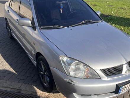 Серый Мицубиси Лансер, объемом двигателя 1.6 л и пробегом 524 тыс. км за 3800 $, фото 1 на Automoto.ua