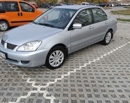 Сірий Міцубісі Lancer, об'ємом двигуна 1.6 л та пробігом 267 тис. км за 3600 $, фото 1 на Automoto.ua