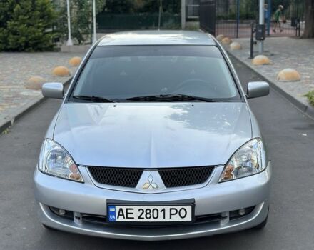 Сірий Міцубісі Lancer, об'ємом двигуна 1.6 л та пробігом 320 тис. км за 4000 $, фото 1 на Automoto.ua