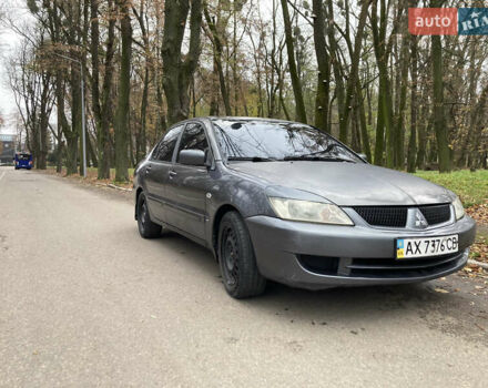 Серый Мицубиси Лансер, объемом двигателя 1.6 л и пробегом 222 тыс. км за 4900 $, фото 1 на Automoto.ua