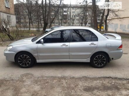 Мицубиси Лансер 2006 в Киеве на Automoto.ua Серый Мицубиси Лансер, объемом двигателя 1.58 л и пробегом 340 тыс. км за 4000 $, фото 1 на Automoto.ua