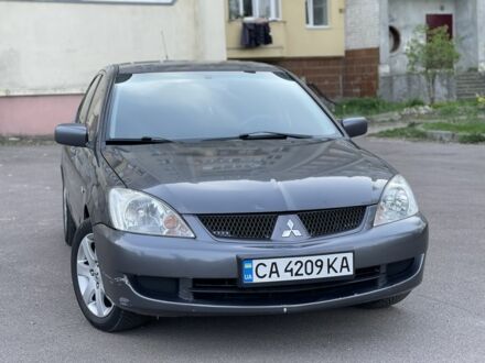 Мицубиси Лансер 2006 в Черкассах на Automoto.ua Серый Мицубиси Лансер, объемом двигателя 1.6 л и пробегом 250 тыс. км за 4950 $, фото 1 на Automoto.ua