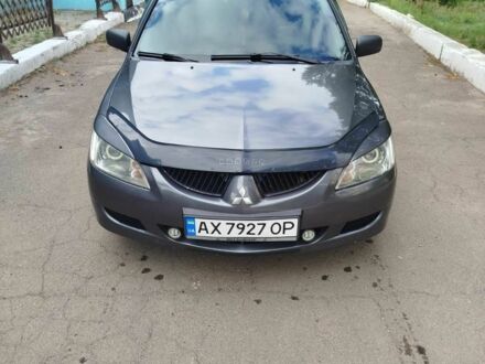 Серый Мицубиси Лансер, объемом двигателя 0 л и пробегом 250 тыс. км за 4000 $, фото 1 на Automoto.ua