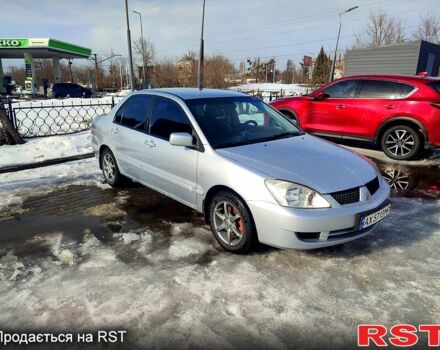 Серый Мицубиси Лансер, объемом двигателя 1.6 л и пробегом 28600 тыс. км за 3200 $, фото 1 на Automoto.ua