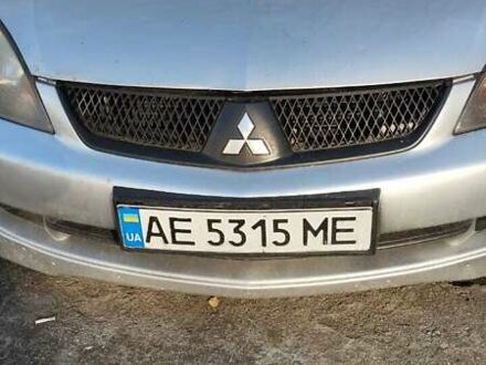 Серый Мицубиси Лансер, объемом двигателя 2 л и пробегом 284 тыс. км за 4100 $, фото 1 на Automoto.ua