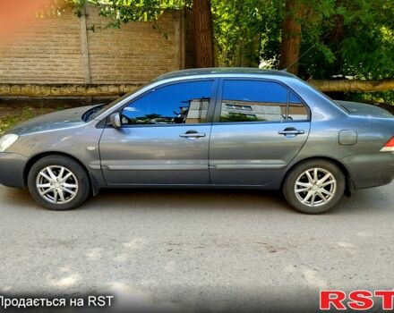 Серый Мицубиси Лансер, объемом двигателя 1.6 л и пробегом 214 тыс. км за 4500 $, фото 1 на Automoto.ua