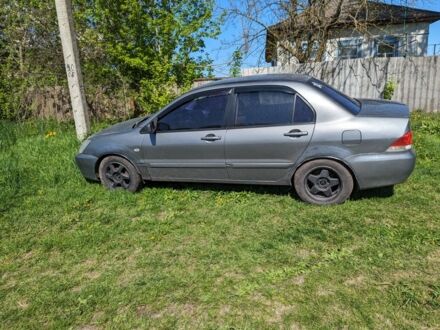 Сірий Міцубісі Lancer, об'ємом двигуна 1.6 л та пробігом 290 тис. км за 3800 $, фото 1 на Automoto.ua