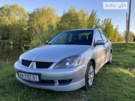 Сірий Міцубісі Lancer, об'ємом двигуна 2 л та пробігом 205 тис. км за 5500 $, фото 1 на Automoto.ua