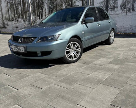 Сірий Міцубісі Lancer, об'ємом двигуна 1.58 л та пробігом 280 тис. км за 3897 $, фото 1 на Automoto.ua
