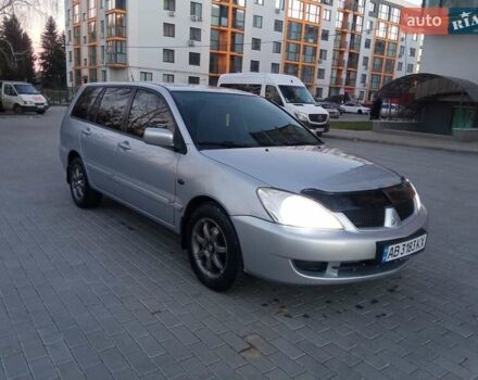 Сірий Міцубісі Lancer, об'ємом двигуна 1.58 л та пробігом 258 тис. км за 2999 $, фото 1 на Automoto.ua