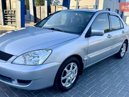 Сірий Міцубісі Lancer, об'ємом двигуна 1.6 л та пробігом 263 тис. км за 4900 $, фото 1 на Automoto.ua