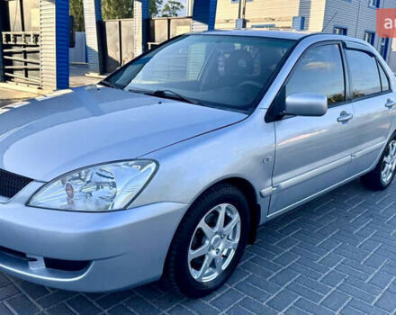 Сірий Міцубісі Lancer, об'ємом двигуна 1.6 л та пробігом 263 тис. км за 4900 $, фото 1 на Automoto.ua