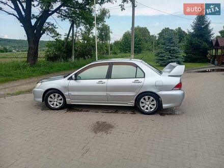 Мицубиси Лансер 2006 в Снятине на Automoto.ua Серый Мицубиси Лансер, объемом двигателя 1.58 л и пробегом 217 тыс. км за 4400 $, фото 1 на Automoto.ua