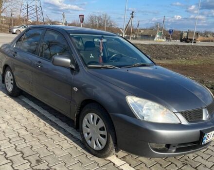 Сірий Міцубісі Lancer, об'ємом двигуна 1.6 л та пробігом 255 тис. км за 4500 $, фото 1 на Automoto.ua