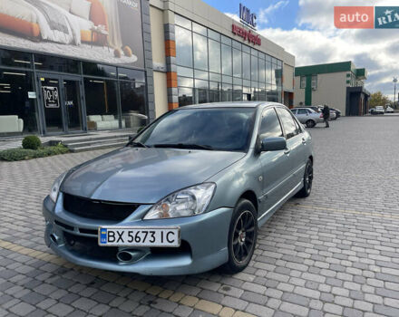 Сірий Міцубісі Lancer, об'ємом двигуна 1.58 л та пробігом 350 тис. км за 3300 $, фото 1 на Automoto.ua