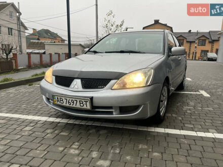 Серый Мицубиси Лансер, объемом двигателя 1.58 л и пробегом 333 тыс. км за 2500 $, фото 1 на Automoto.ua