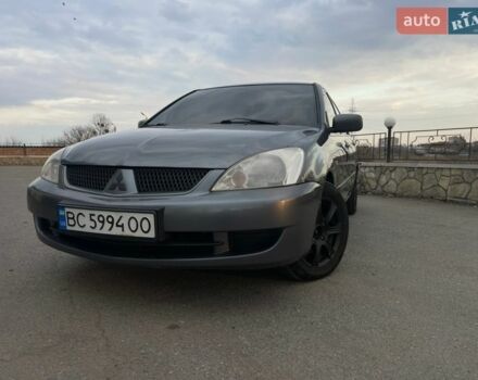 Сірий Міцубісі Lancer, об'ємом двигуна 1.58 л та пробігом 290 тис. км за 3400 $, фото 1 на Automoto.ua