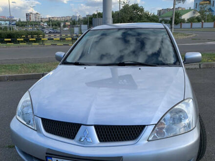 Сірий Міцубісі Lancer, об'ємом двигуна 1.6 л та пробігом 201 тис. км за 4200 $, фото 1 на Automoto.ua