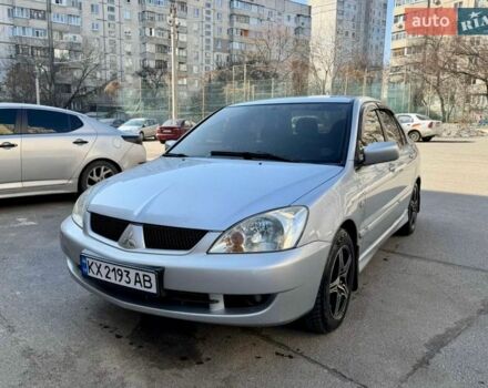 Серый Мицубиси Лансер, объемом двигателя 1.58 л и пробегом 224 тыс. км за 4000 $, фото 1 на Automoto.ua