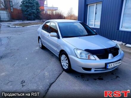 Сірий Міцубісі Lancer, об'ємом двигуна 1.6 л та пробігом 180 тис. км за 3750 $, фото 1 на Automoto.ua