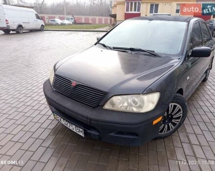 Сірий Міцубісі Lancer, об'ємом двигуна 2 л та пробігом 212 тис. км за 3333 $, фото 1 на Automoto.ua