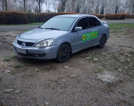 Сірий Міцубісі Lancer, об'ємом двигуна 1.6 л та пробігом 264 тис. км за 3200 $, фото 1 на Automoto.ua