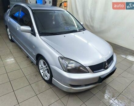 Серый Мицубиси Лансер, объемом двигателя 2 л и пробегом 284 тыс. км за 4100 $, фото 1 на Automoto.ua