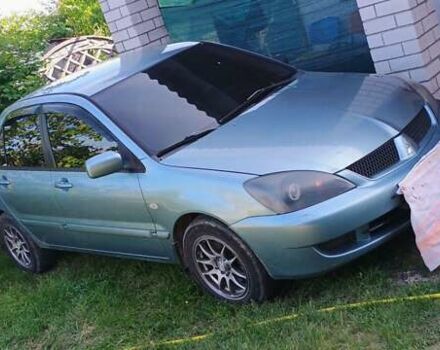 Серый Мицубиси Лансер, объемом двигателя 1.6 л и пробегом 280 тыс. км за 4700 $, фото 1 на Automoto.ua