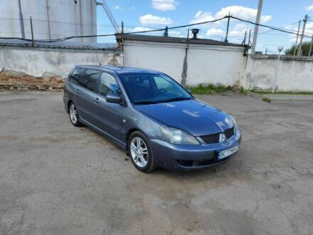 Міцубісі Lancer 2006 у Львові на Automoto.ua Сірий Міцубісі Lancer, об'ємом двигуна 2 л та пробігом 267 тис. км за 3300 $, фото 1 на Automoto.ua