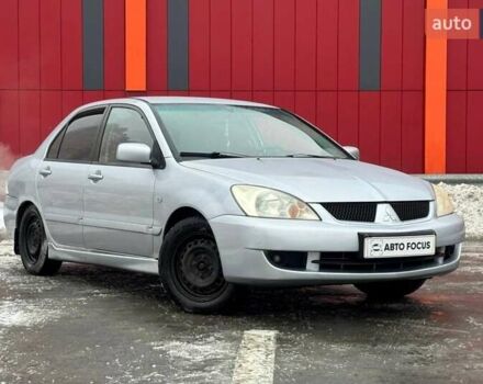 Серый Мицубиси Лансер, объемом двигателя 1.6 л и пробегом 263 тыс. км за 4190 $, фото 1 на Automoto.ua