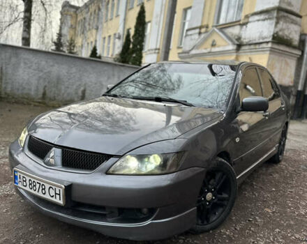 Сірий Міцубісі Lancer, об'ємом двигуна 2 л та пробігом 200 тис. км за 4999 $, фото 1 на Automoto.ua