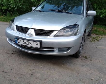 Сірий Міцубісі Lancer, об'ємом двигуна 1.6 л та пробігом 300 тис. км за 3918 $, фото 1 на Automoto.ua