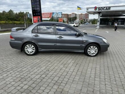 Мицубиси Лансер 2006 в Львове на Automoto.ua Серый Мицубиси Лансер, объемом двигателя 1.6 л и пробегом 240 тыс. км за 2550 $, фото 1 на Automoto.ua