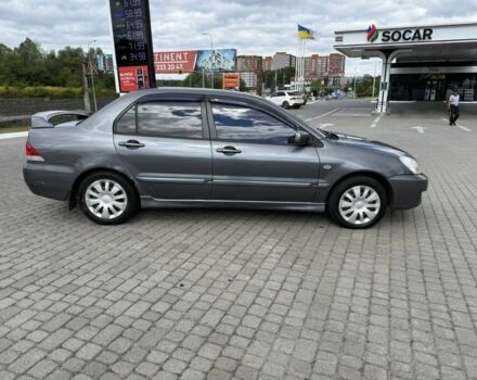 Сірий Міцубісі Lancer, об'ємом двигуна 1.6 л та пробігом 240 тис. км за 2550 $, фото 1 на Automoto.ua