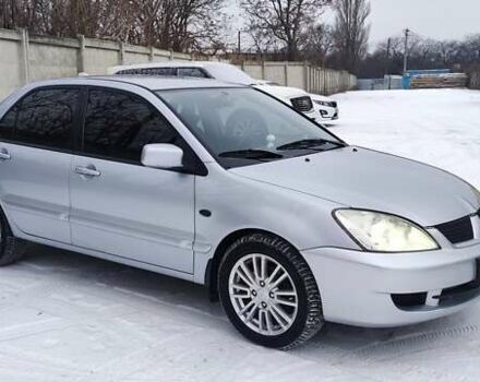 Серый Мицубиси Лансер, объемом двигателя 1.8 л и пробегом 190 тыс. км за 5500 $, фото 1 на Automoto.ua