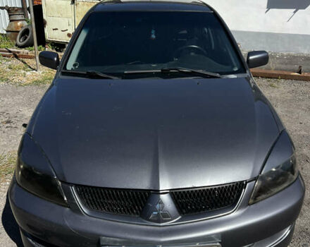 Сірий Міцубісі Lancer, об'ємом двигуна 2 л та пробігом 200 тис. км за 2500 $, фото 1 на Automoto.ua