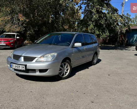 Сірий Міцубісі Lancer, об'ємом двигуна 1.6 л та пробігом 284 тис. км за 4000 $, фото 1 на Automoto.ua