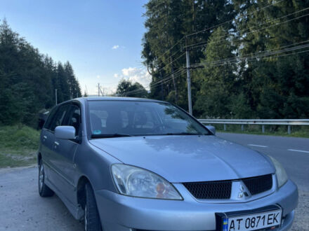 Сірий Міцубісі Lancer, об'ємом двигуна 1.6 л та пробігом 167 тис. км за 3800 $, фото 1 на Automoto.ua