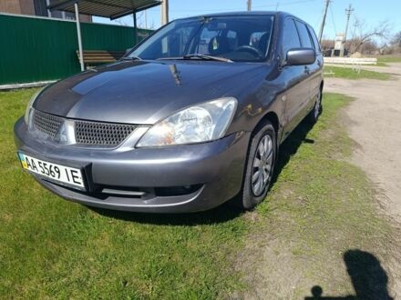 Сірий Міцубісі Lancer, об'ємом двигуна 1.6 л та пробігом 298 тис. км за 2900 $, фото 1 на Automoto.ua