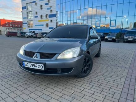Серый Мицубиси Лансер, объемом двигателя 1.6 л и пробегом 279 тыс. км за 3990 $, фото 1 на Automoto.ua
