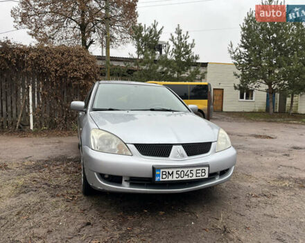 Сірий Міцубісі Lancer, об'ємом двигуна 1.58 л та пробігом 308 тис. км за 3700 $, фото 1 на Automoto.ua