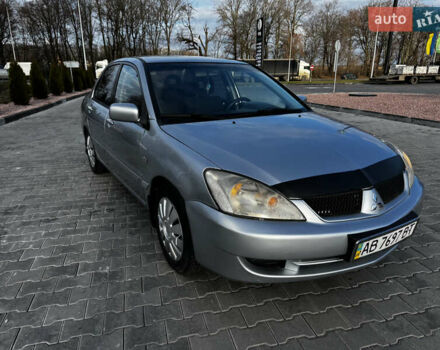 Сірий Міцубісі Lancer, об'ємом двигуна 1.58 л та пробігом 333 тис. км за 2550 $, фото 1 на Automoto.ua