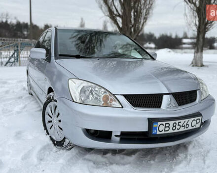 Сірий Міцубісі Lancer, об'ємом двигуна 1.6 л та пробігом 264 тис. км за 3950 $, фото 1 на Automoto.ua