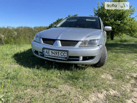 Сірий Міцубісі Lancer, об'ємом двигуна 1.6 л та пробігом 249 тис. км за 3250 $, фото 1 на Automoto.ua