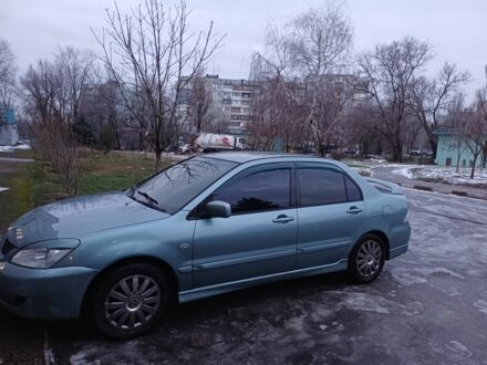 Сірий Міцубісі Lancer, об'ємом двигуна 1.6 л та пробігом 228 тис. км за 4700 $, фото 1 на Automoto.ua