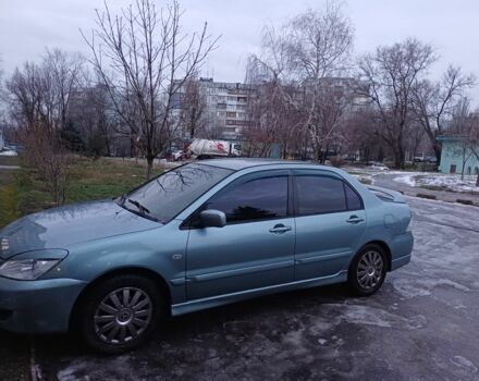 Сірий Міцубісі Lancer, об'ємом двигуна 1.6 л та пробігом 228 тис. км за 4700 $, фото 1 на Automoto.ua