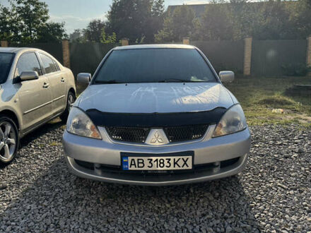 Сірий Міцубісі Lancer, об'ємом двигуна 1.6 л та пробігом 255 тис. км за 3500 $, фото 1 на Automoto.ua