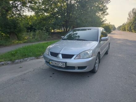 Сірий Міцубісі Lancer, об'ємом двигуна 1.6 л та пробігом 320 тис. км за 4299 $, фото 1 на Automoto.ua