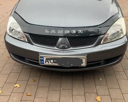 Сірий Міцубісі Lancer, об'ємом двигуна 1.6 л та пробігом 170 тис. км за 4700 $, фото 1 на Automoto.ua