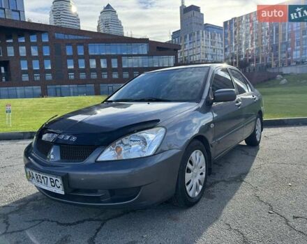 Сірий Міцубісі Lancer, об'ємом двигуна 1.58 л та пробігом 276 тис. км за 3650 $, фото 1 на Automoto.ua